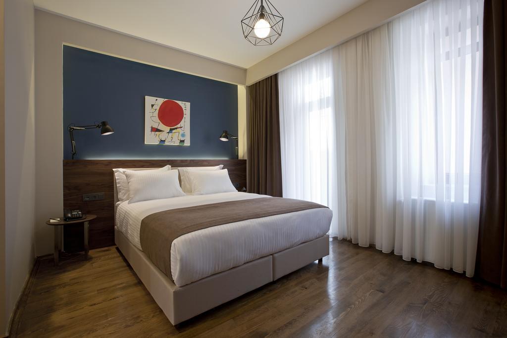 Snog Rooms & Suites Istanbul Bagian luar foto A bedroom at the hotel